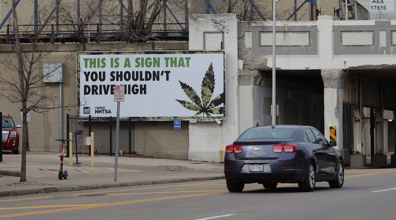 A billboard on South Jefferson Street in downtown Dayton warns motorists against driving stoned on marijuana. CORNELIUS FROLIK / STAFF