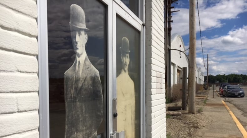 The front doors of the airplane factory the Wright Brothers built between West Third Street and what today is U.S. 35. THOMAS GNAU/STAFF