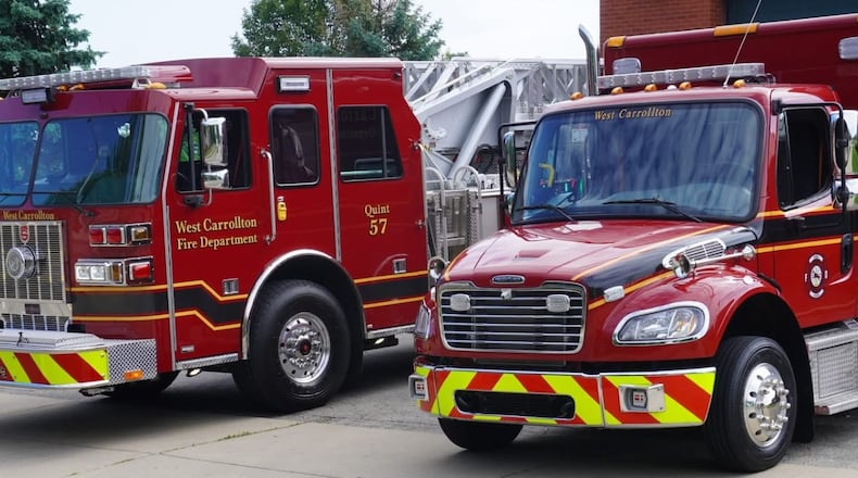 A West Carrollton Fire Department fire truck and ambulance. CONTRIBUTED