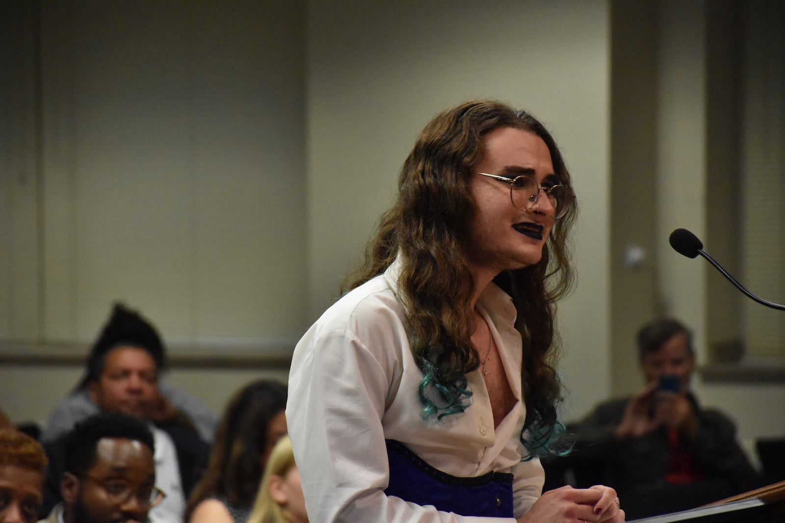Reynard De Spain, a Dayton resident who helped draft a "safe haven" resolution for Athens, speaks at a Dayton City Commission meeting in September. Some LGBTQ+ community members and supporters want Dayton to pass a resolution that they say will help protect trans people. CORNELIUS FROLIK / STAFF