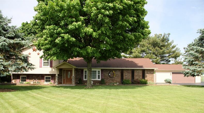 The 4.89-acre property includes the remodeled tri-level, a 2-car detached garage with workshop area, a 3-bay pole barn and a metal barn with horse stalls. The property close to the house has a fenced back yard and the horse barn is near the fenced pasture. CONTRIBUTED PHOTOS BY KATHY TYLER