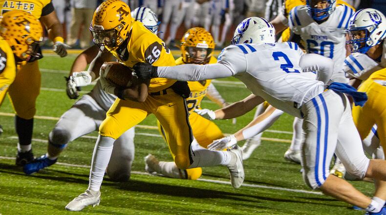 Alter running back Rod Owens heads for the end zone for a touchdown in the first half of a Division IV regional final against Cincinnati Wyoming. Jeff Gilbert/CONTRIBUTED