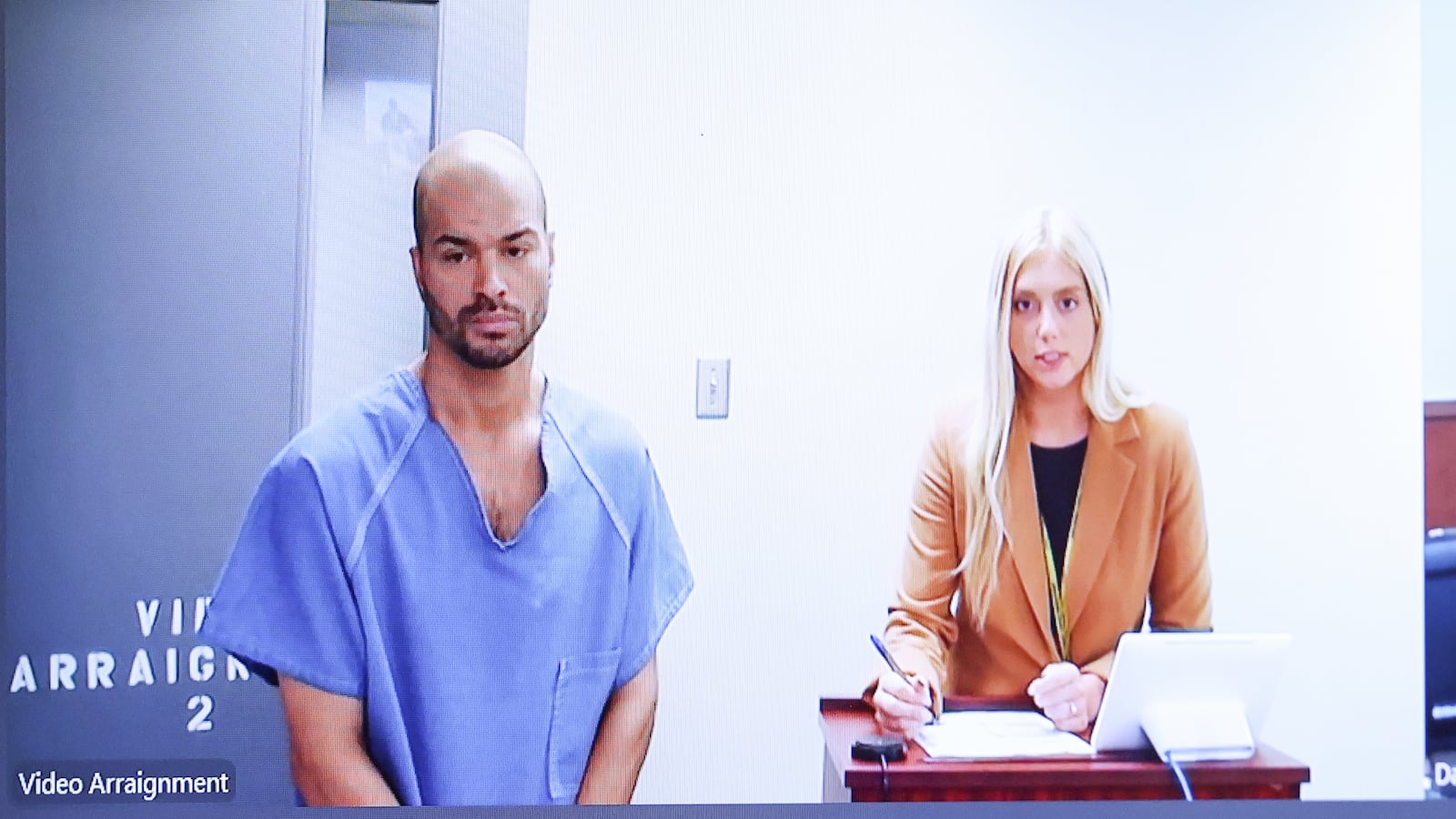 Michael Kendrick (left) appeared electronically before Magistrate Brandon McClain in Dayton Municipal Court. McClain set his bond at $2 million. He is facing three counts of tampering with evidence and one count gross abuse of a corpse for allegedly leaving the body of a 7-year-old boy in grass field in Dayton before collecting his bones. BRYANT BILLING / STAFF