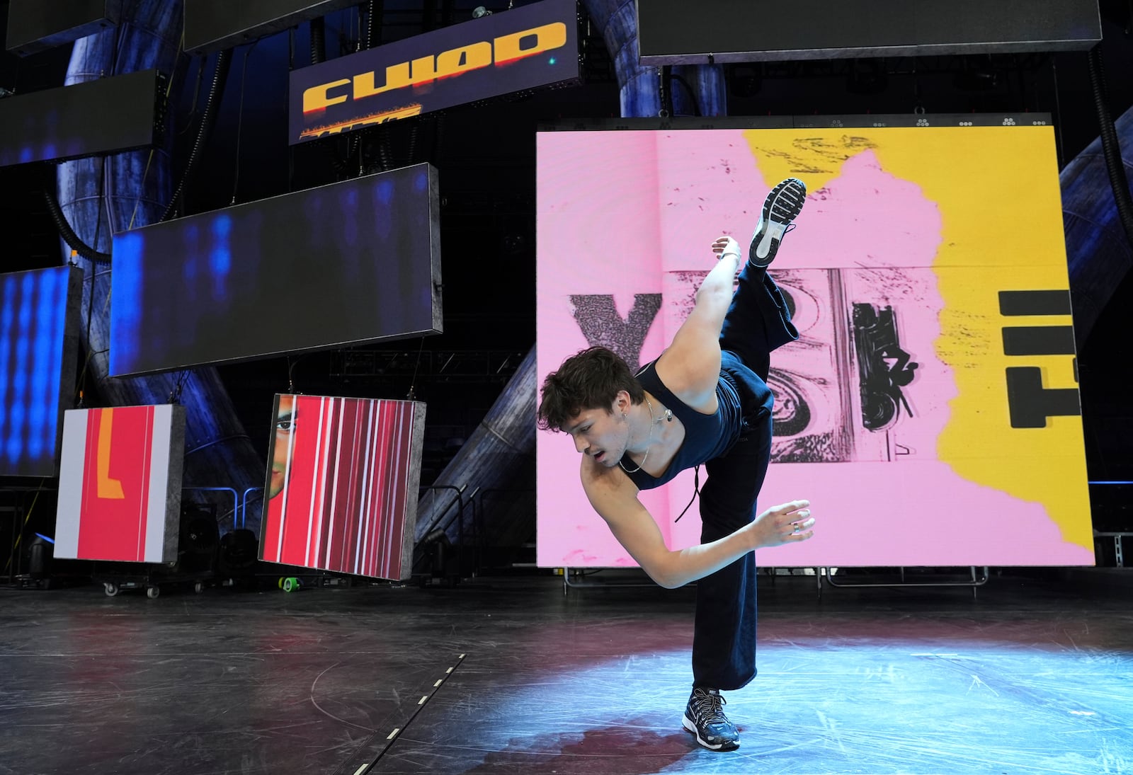 Dancer Diego Pasillas rehearses a move during preparations for Katy Perry's "The Lifetimes Tour" at the Toyota Arena on Wednesday, April 9, 2025, in Ontario, Calif. (AP Photo/Chris Pizzello)