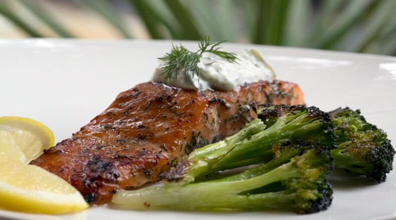 Dill and Sugar Brined Broiled Salmon with roasted broccoli. It can be topped with Cucumber-Yogurt Sauce. (Kathleen Galligan/Detroit Free Press/TNS)