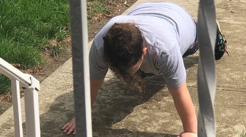 Cate Tankersley’s daughter got outside Friday to do some push-ups after softball practice has been cancelled because of coronavirus. CONTRIBUTED