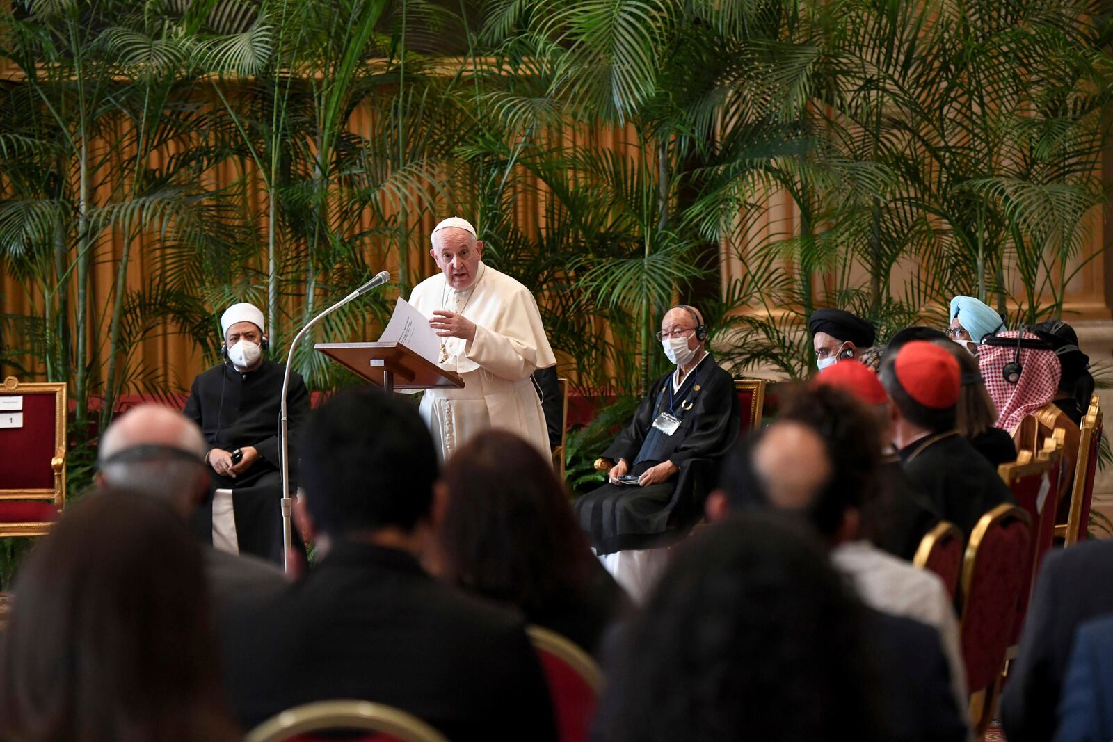 FILE - Pope Francis speaks at a conference with religious leaders in an appeal to governments to commit to ambitious climate targets, at the Vatican, Oct. 4, 2021. (Alessandro Di Meo, Pool via AP, File)