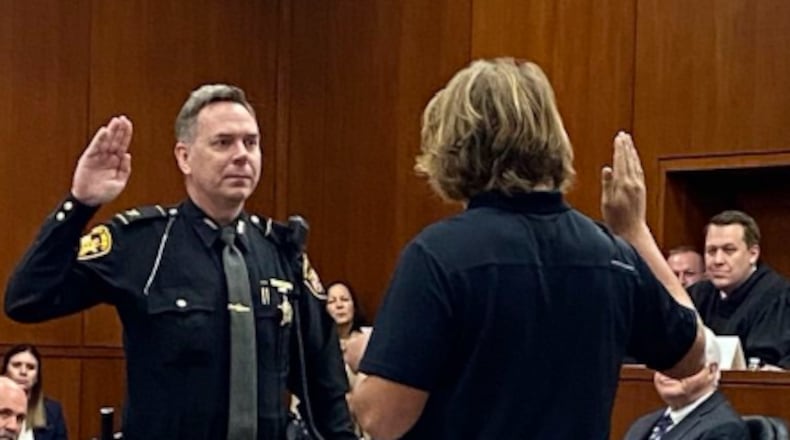 Warren County Sheriff Barry Riley was sworn in Dec. 17, 2024, by Jackson Dulle, son of Sgt. Brian Dulle who was killed in the line of duty in 2011. CONTRIBUTED