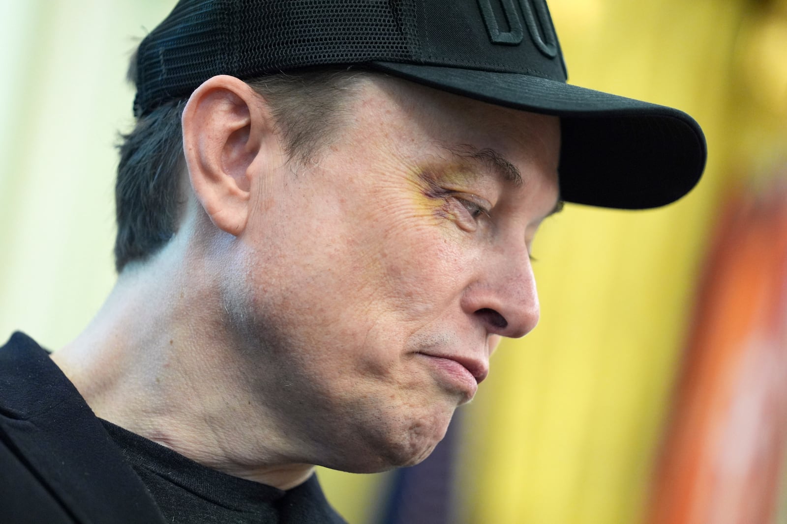 Elon Musk listens as President Donald Trump speaks during a news conference in the Oval Office of the White House, Friday, May 30, 2025, in Washington. (AP Photo/Evan Vucci)