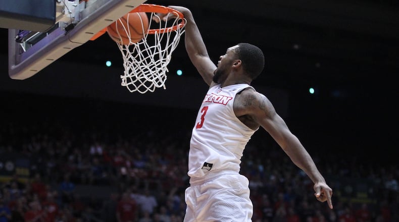 Dayton’s Trey Landers dunks in the second half against Rhode Island on Tuesday, Feb. 20, 2018, at UD Arena. David Jablonski/Staff