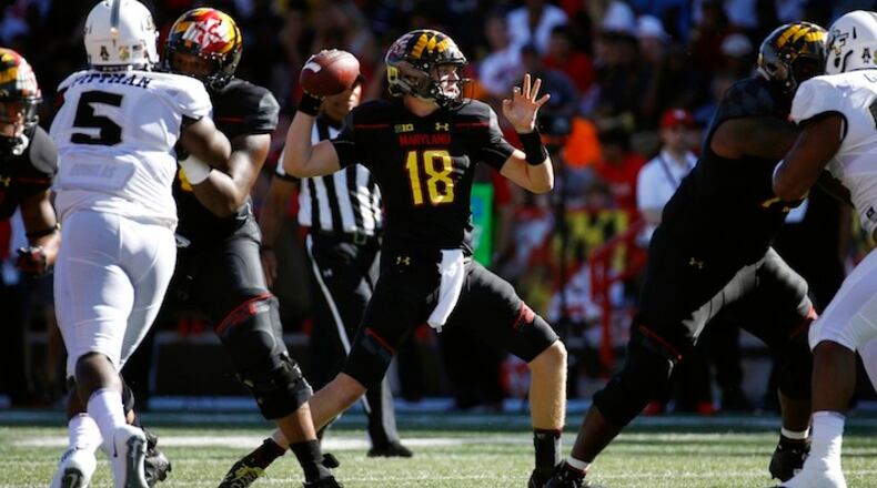 Maryland quarterback Max Bortenschlager (18) throws to a receiver in the first half of an NCAA college football game against Central Florida in College Park, Md., Saturday, Sept. 23, 2017. (AP Photo/Patrick Semansky)