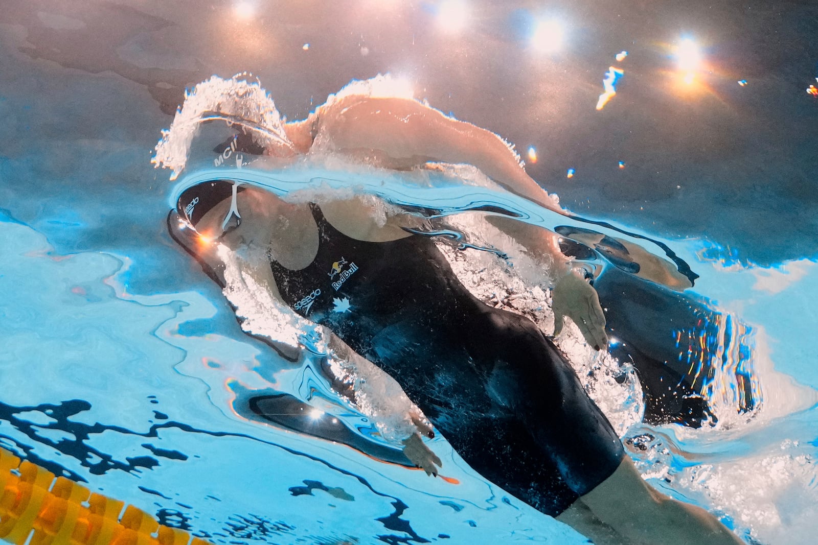 Summer McIntosh of Canada competes in the women's 200-meter individual medley final at the World Aquatics Championships in Singapore, Monday, July 28, 2025. (AP Photo/Lee Jin-man)