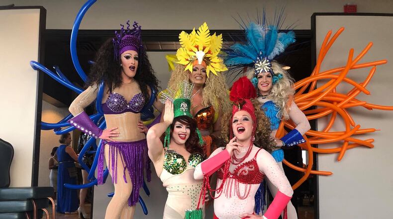 Dayton's famous drag troupe The Rubi Girls helped build some excitement for Masquerage 2018 with a performance at the theme reveal party on Aug. 24. The theme? Rio Nights. AMELIA ROBINSON/STAFF