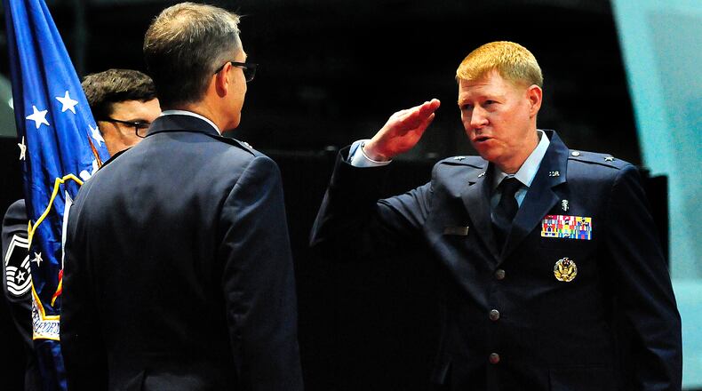 Incoming commander for the 711TH Human Performance Wing Brigadier General Robert K. Bogart salutes during the Assumption Of Command ceremony, Monday, Aug. 21, 2023. MARSHALL GORBY\STAFF