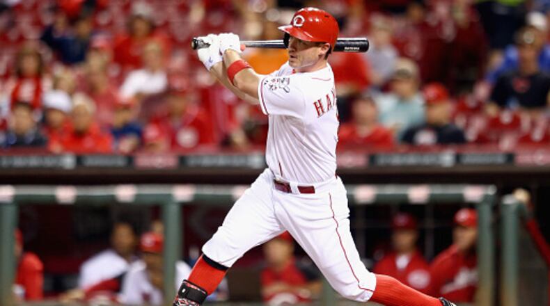 CINCINNATI, OH - SEPTEMBER 24: Jack Hannahan #9 of the Cincinnati Reds hits a single in the third inning during the game against the Milwaukee Brewers at Great American Ball Park on September 24, 2014 in Cincinnati, Ohio. (Photo by Andy Lyons/Getty Images)