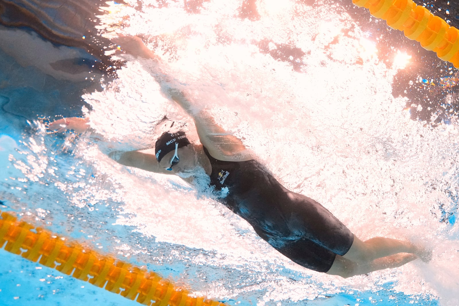 Summer McIntosh of Canada competes in the women's 200-meter individual medley final at the World Aquatics Championships in Singapore, Monday, July 28, 2025. (AP Photo/Lee Jin-man)