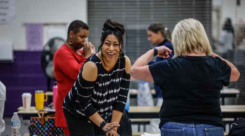 Tara Boone, director of Health Services for Dayton Public Schools, finishes her professional development class for teachers at E.J. Brown Middle School Thursday, August 10, 2023.  JIM NOELKER/STAFF