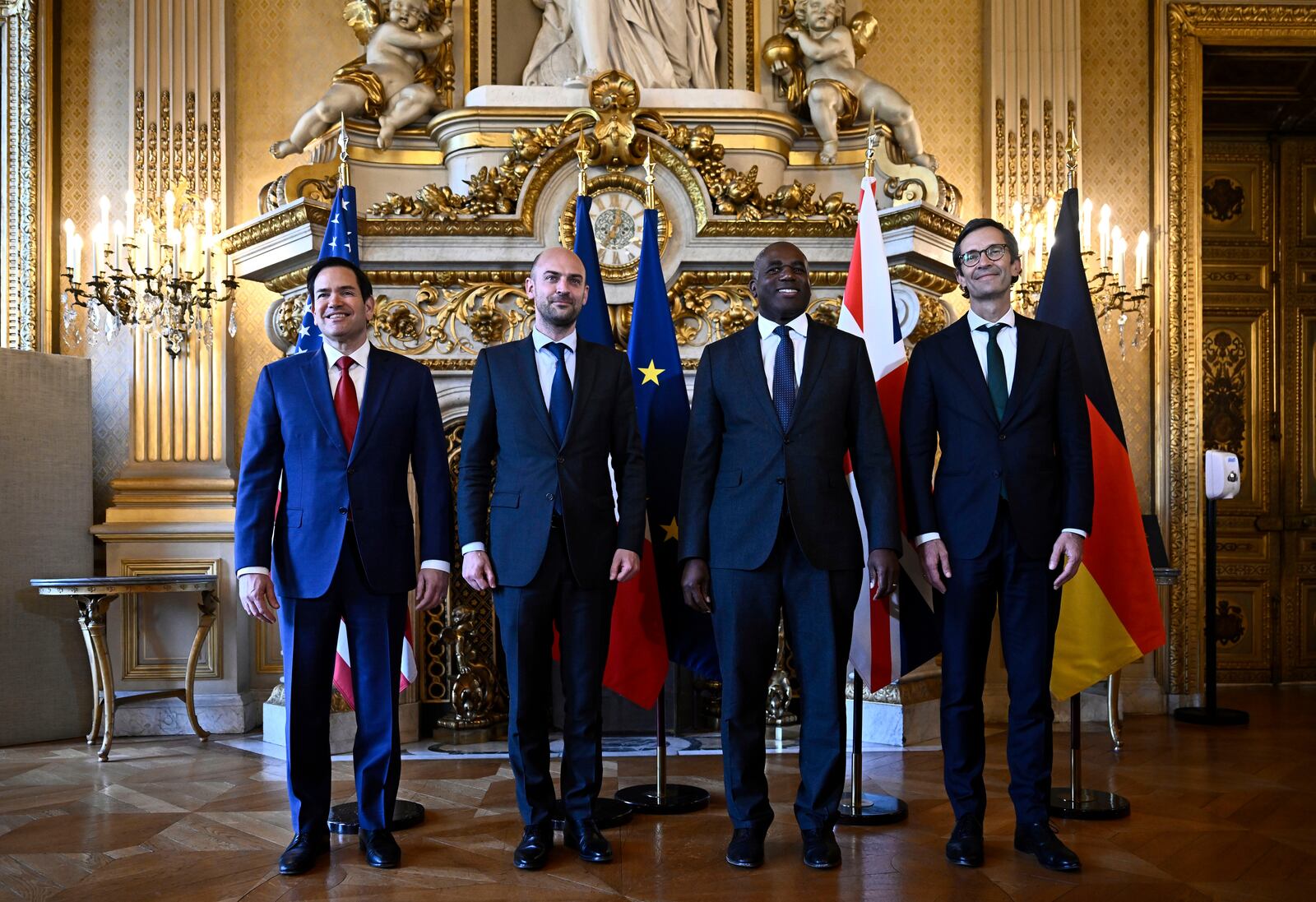 Germany's Political Director of the Ministry of Foreign Affairs Gunter Sautter, right, French Foreign Minister Jean-Noel Barrot, second left, Britain's Foreign Secretary David Lammy, second right, and US Secretary of State Marco Rubio pose before high-level talks to discuss Ukraine and its security, in Paris Thursday, April 17, 2025. (Julien de Rosa, Pool via AP)