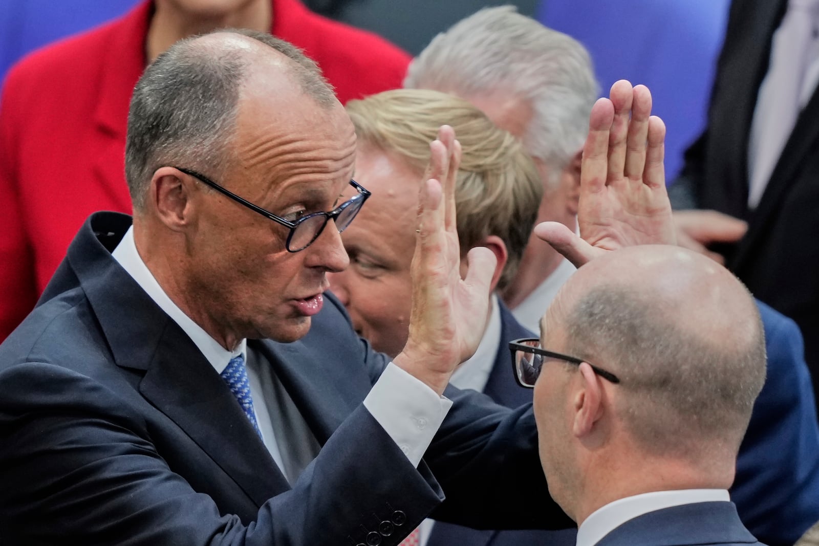 Leader of the Christian Democrats Friedrich Merz reacts after being elected new chancellor at the German federal parliament, Bundestag, at the Reichstag building in Berlin, Germany, Tuesday, May 6, 2025. (AP Photo/Ebrahim Noroozi)