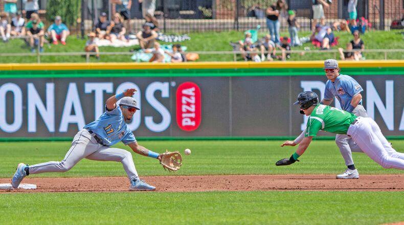 Dayton outfielder Ethan O'Donnell steals second base in the third inning Sunday at Day Air Ballpark as the throw eludes Lake County shortstop Angel Genao. Jeff Gilbert/CONTRIBUTED