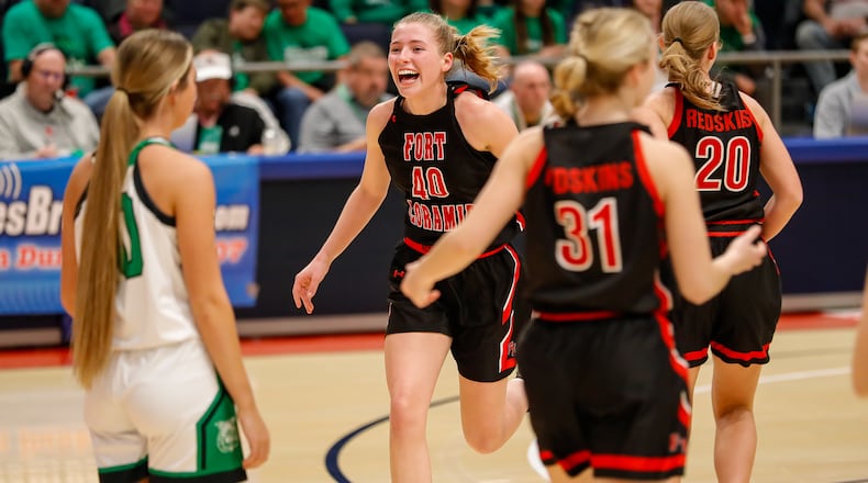 Fort Loramie High School junior Avery Brandewie celebrates as she is subbed off the floor during the Division IV state championship game against Waterford on Saturday, March 16, 2024 at University of Dayton Arena. Michael Cooper/CONTRIBUTED