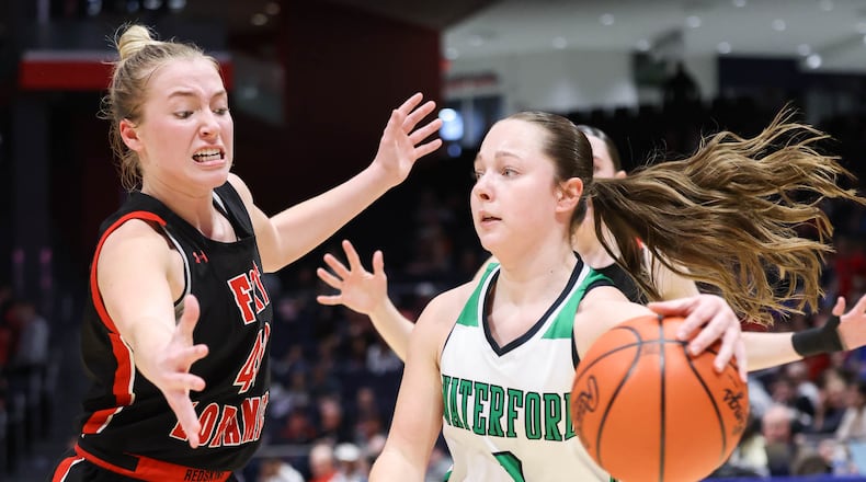 Fort Loramie senior forward Avery Brandewie guards Waterford's Elsie Malec during the Division VII state final on Saturday at University of Dayton Arena. Brandewie scored eight points and had four steals and 12 rebounds in the 48-46 loss. BRYANT BILLING / STAFF