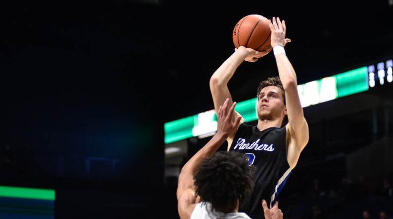 Springboro’s Noah Moser puts up a shot during their game against Moeller. Archbishop Moeller defeated Springboro 65-25 in their Division I district basketball final Sunday, March 8, 2020 at Xavier University’s Cintas Center. NICK GRAHAM / STAFF