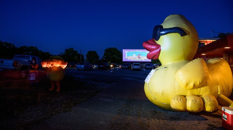 A socially distanced version of the 17th Annual URS Rubber Duck Regatta, a benefit for United Rehabilitation Services, was held on Friday, September 18, 2020, at the Dixie Twin Drive-In. RiverScape MetroPark, the event's regular venue, couldn't be used due to COVID-19 event restrictions. A virtual duck drop from a past regatta filmed by photographer Andy Snow was shown on the big screen. The movies "Back to the Future" and "How to Train Your Dragon" were shown simultaneously after the virtual duck drop. TOM GILLIAM/CONTRIBUTING PHOTOGRAPHER
