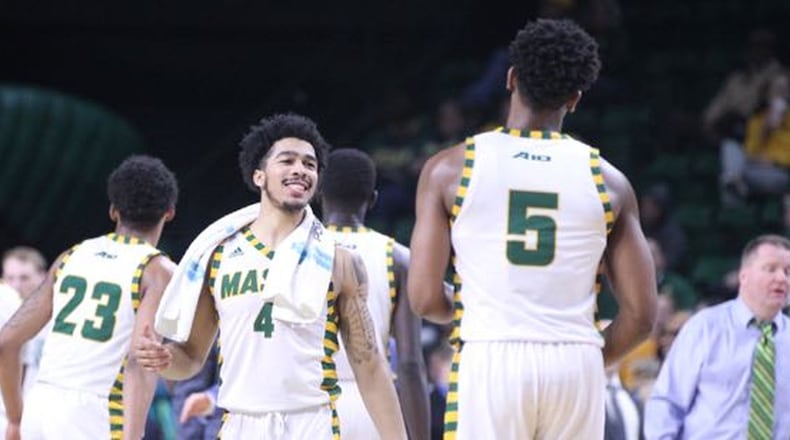 George Mason’s Otis Livingston II (4) smiles during a game against Dayton on Wednesday, Feb. 14, 2018, at EagleBank Arena in Fairfax, Va. David Jablonski/Staff