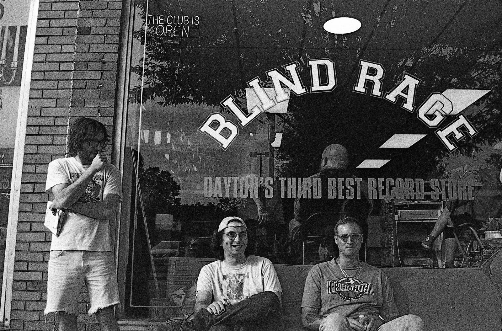 (From left) Brandon Berry, Jack Radachi and another person outside at Blind Rage Records' last show at the Belmont location. JAKE SCHNEIDER/CONTRIBUTED