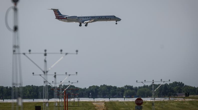 A passenger plane lands at Dayton International Airport Friday morning June 3, 2022. According to a recent survey, Dayton International Airport saw the biggest airfare increase of airport across the country. JIM NOELKER/STAFF