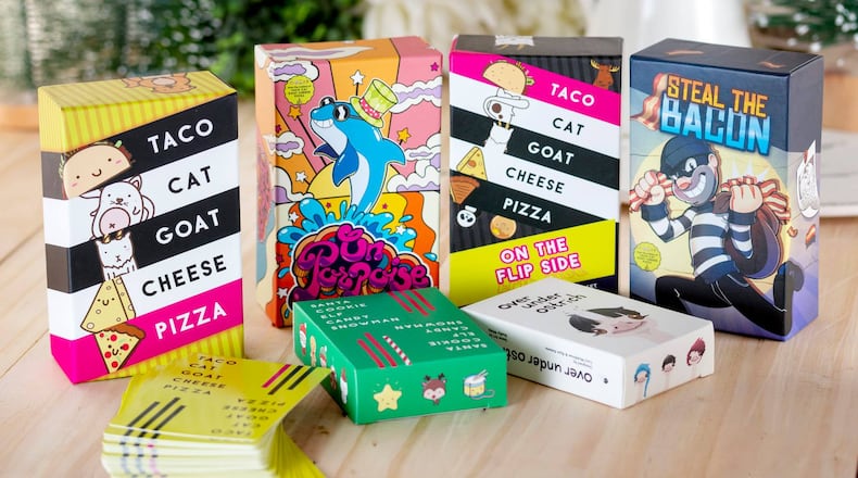 Englewood-based Dolphin Hat Games has released several card games, including the widely popular “Taco Cat Goat Cheese Pizza,” which hit the number one spot for games sold on Amazon.com, and which has been distributed in over 40 countries. CONTRIBUTED