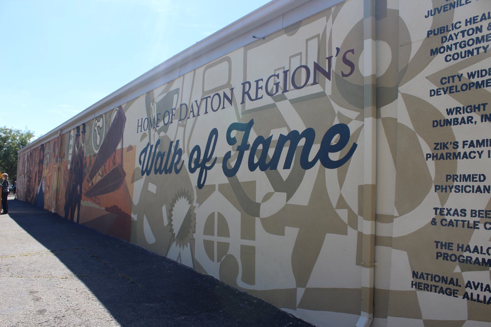 Photo from the dedication of the Dayton  Region's  Walk of Fame mural wall in  Dayton Wright-Dunbar neighborhood. The mural was designed by Dayton artist James Pate. The dedication followed the 2017 walk of fame induction ceremony.