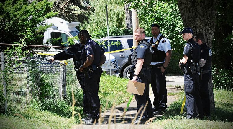 The bodies of a woman and girl were found Thursday, June 23, 2022, inside a house in the 300 block of Burleigh Avenue in Dayton. MARSHALL GORBY/STAFF