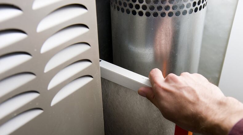 By installing your filter backwards, air will have a harder time flowing through the filter and your air handler will have to work harder to make up for the loss of airflow. (Brad Calkins/Dreamstime/TNS)