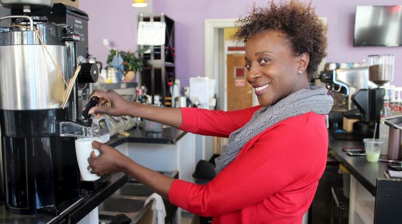 Juanita Darden, founder and owner of Third Perk Coffeehouse & Wine Bar, is planning to open a fourth shop in Beavercreek. STAFF
