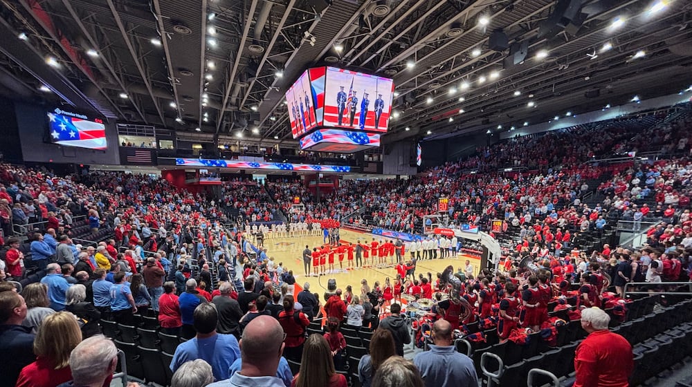 Dayton and Illinois State stand for the national anthem before a game in the quarterfinals of the National Invitation Tournament on Wednesday, March 25, 2026, at UD Arena. David Jablonski/Staff