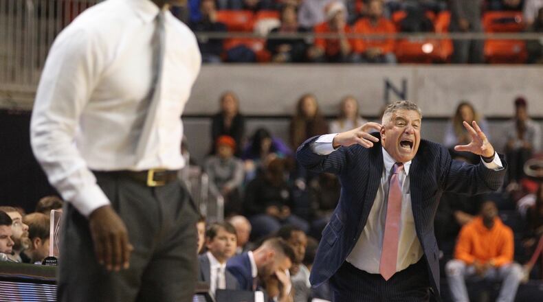 Auburn’s Bruce Pearl, right, yells to his team during a game against Dayton on Saturday, Dec. 8, 2018, at Auburn Arena in Auburn, Ala.