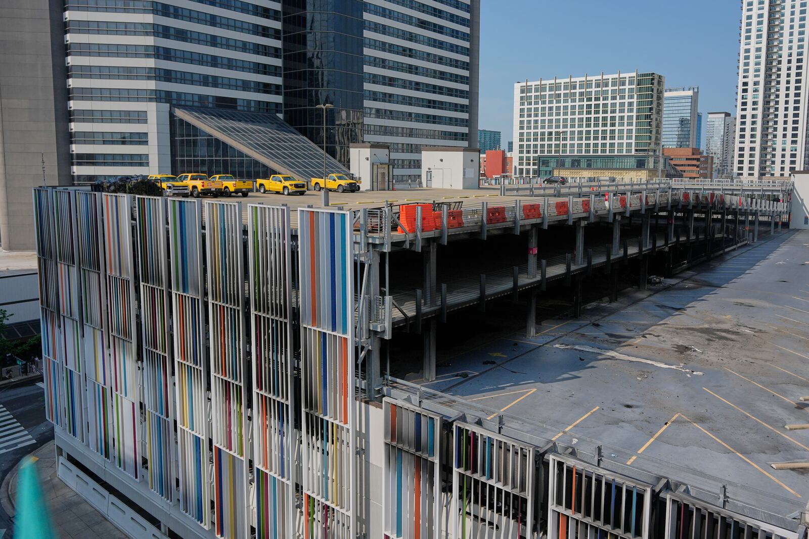 A garage where vehicles caught and a floor of the structure collapsed is seen Tuesday, June 10, 2025, in Nashville, Tenn. (AP Photo/George Walker IV)
