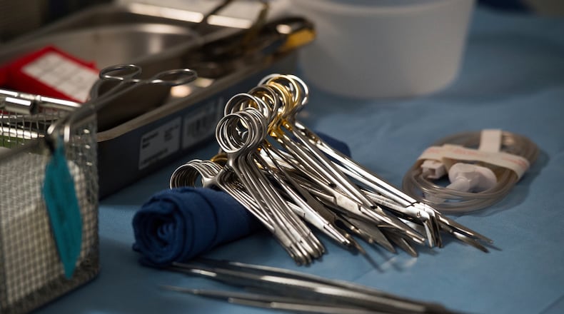FILE - Surgical instruments and supplies lay on a table during a kidney transplant surgery at MedStar Georgetown University Hospital in Washington D.C., June 28, 2016. (AP Photo/Molly Riley, File)