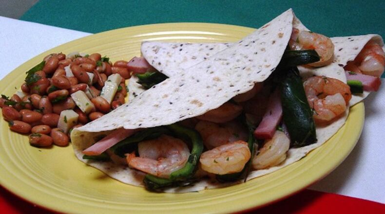 Shrimp and Poblano Pepper Tacos with Pinto Bean Salad (Linda Gassenheimer/TNS)