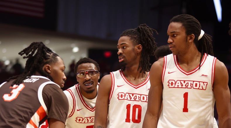 Dayton players (left to right) Keonte Jones, Bryce Heard and Malcolm Thomas line up for an in-bounds play during exhibition game against Bowling Green on Monday, Oct. 27, 2025, at UD Arena. David Jablonski/Staff