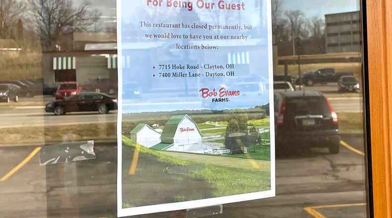 A sign posted recently at the Englewood Bob Evans says the restaurant is closed for good. AIMEE HANCOCK / STAFF