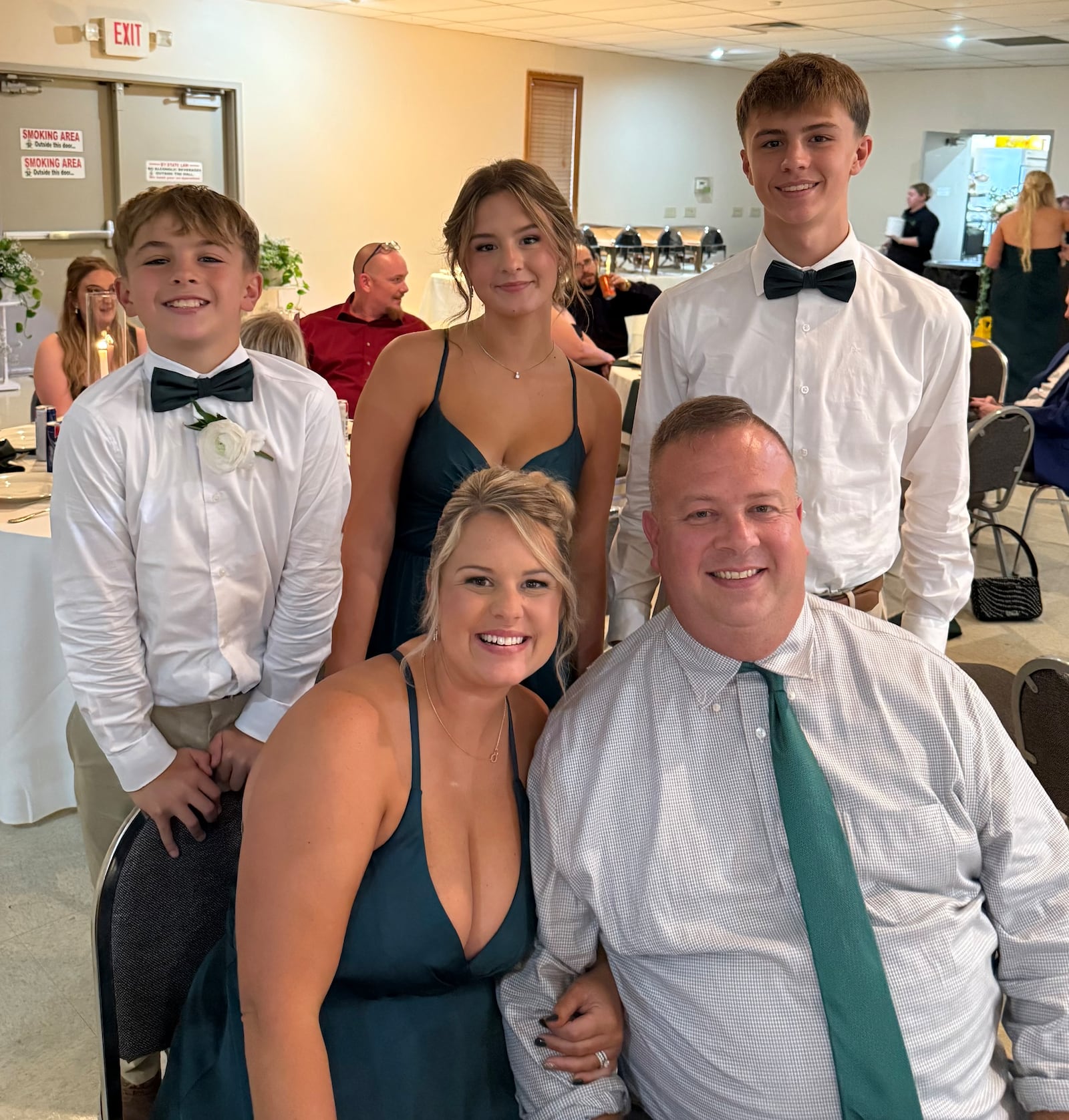 Megan Bryan is the owner of The SugarLand Social in West Milton. Pictured is her family (left to right starting with the back row) Tanner, Kaydence and Ian with Megan Bryan and her partner, John Lodge, in the front (CONTRIBUTED PHOTO)