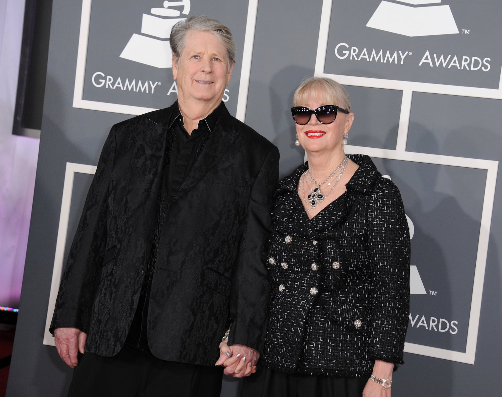 FILE - Musician Brian Wilson, left, and his wife Melinda Ledbetter Wilson arrive at the 55th annual Grammy Awards on Sunday, Feb. 10, 2013, in Los Angeles. (Photo by Jordan Strauss/Invision/AP, File)
