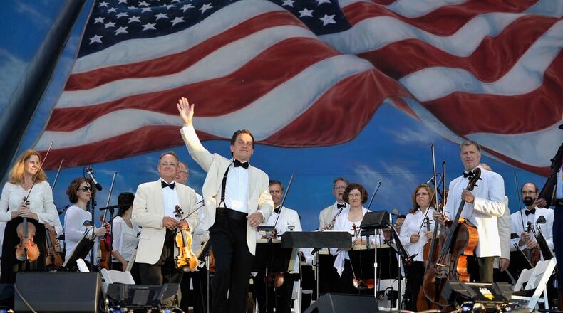 Keith Lockhart and the Boston Pops perform at Boston Pops On Nantucket Hosted By Real Simple and Coastal Living at Jetties Beach on August 9, 2014 in Nantucket, Massachusetts.