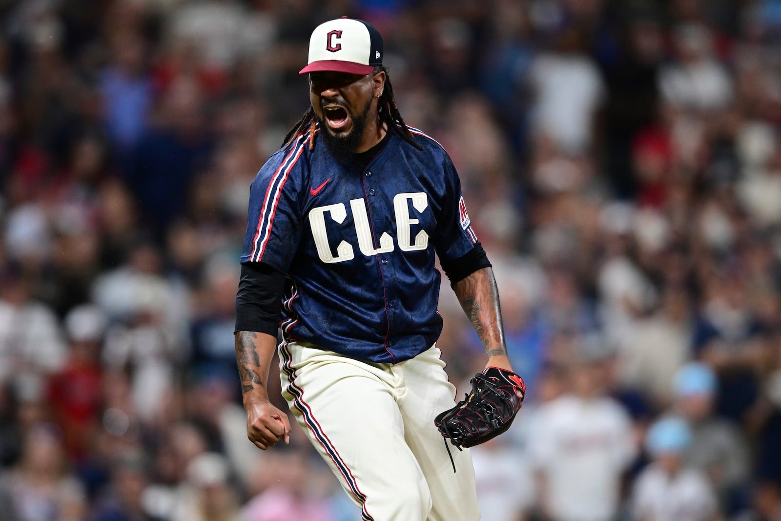 Cleveland Guardians relief pitcher Emmanuel Clase reacts after the Guardians defeated the Athletics in a baseball game, Friday, July 18, 2025, in Cleveland. (AP Photo/David Dermer)