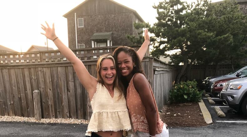 Kasey Hughes  (left), who played basketball at Baldwin Wallace, and Cameron Campbell (right), a track athlete at Wright State, became friends as 8-year-old soccer teammates and continued their bond through Springboro High School and now as recent college graduates. The pair miraculously survived the Oregon District mass shooting last Aug. 4 . CONTRIBUTED