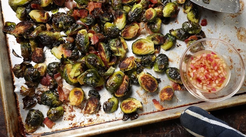 Roasted Brussels sprouts with bacon are served with a simple sweet and sour vinaigrette. Styling by Joan Moravek. (Abel Uribe/Chicago Tribune/TNS)