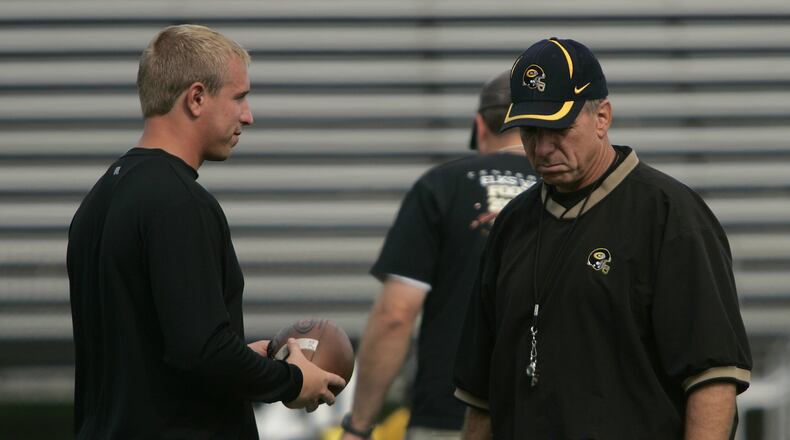 Brett Ullery (left) was an assistant for his father Ron Ullery at Centerville in 2008. Jim Noelker/Dayton Daily News